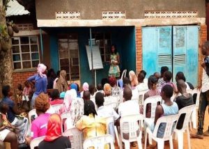 Facilitating a community outreach in Katoogo slum